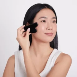 Plum Beauty Obsidian Gua Sha Stone -Serene Skin GUEST bb09ddc9 6f2f 4138 9c19 0283a25fa4c2